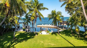 Lush tropical plantings in a gated compound located directly on the Florida Bay cottage